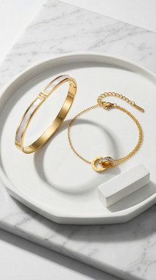 L Equilibre Perfect: Duo goldener Skulpturenstöcke & reine Geometrie  
