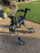 SOLD Rollafold 4 wheeled walker with seat