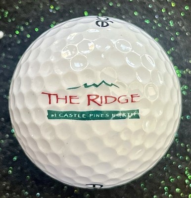 The RIDGE at Castle Pines Logo  COLLECTIBLE VINTAGE Pinnacle GOLD Golf Ball~MINT