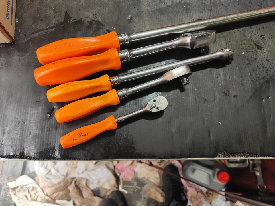 Mango naranja a presión (duro) Foto 2 de 4