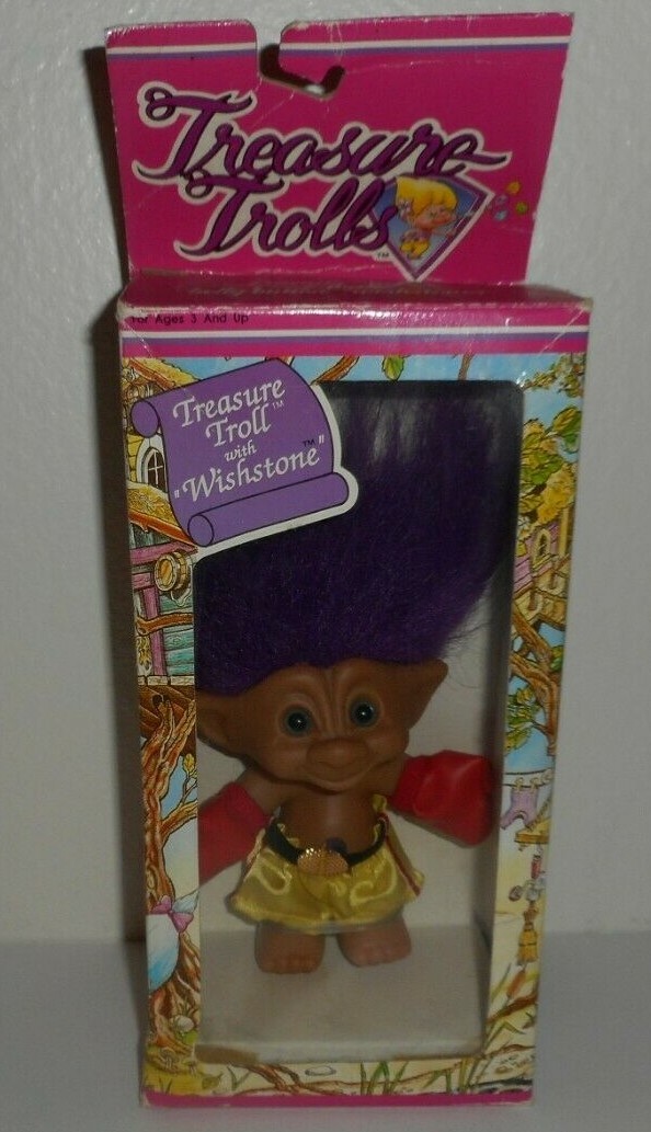 troll doll with gem in belly