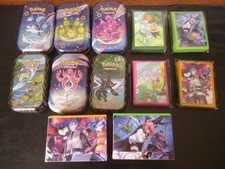 Lot de 4 x 65 sleeves et 6 tins VIDES Pokémon - Sophora Helio Mashynn Keeteleria