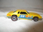 Vintage Hot Wheels Redlines,  1974 Monte Carlo, yellow with decals,  Hong Kong