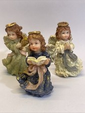 3 Beautiful Resin Angels Christmas Ornament/Figurines Gently Used