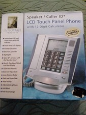Innovage Products LCD Touch Panel Phone W/ Calculator  Calendar 2005 Needs 3 AA