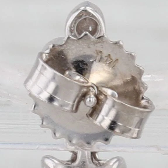 Pendientes colgantes de oro blanco de 14 k con halo de diamantes pera de 3,10 quilates Foto 4 de 4