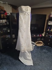 Strapless wedding dress comes with cover slip and a veil