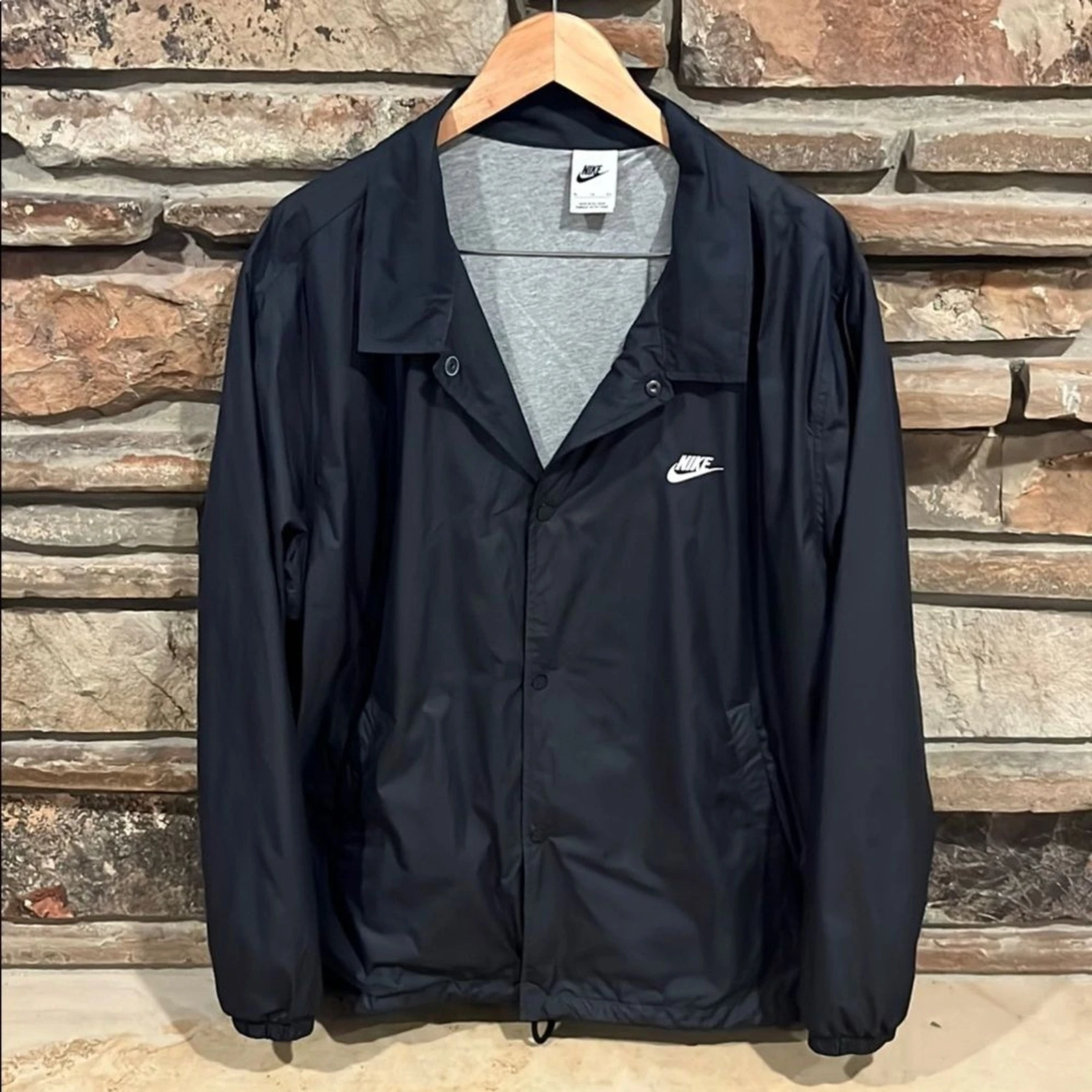 Giacca a vento foderata nera Nike Club Coach