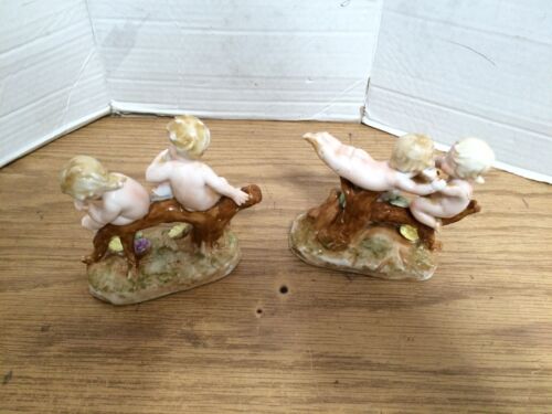 Coppia antiche statuine cherubini porcellana putti su tronco fiori stile Capodimonte - Foto 6 di 11