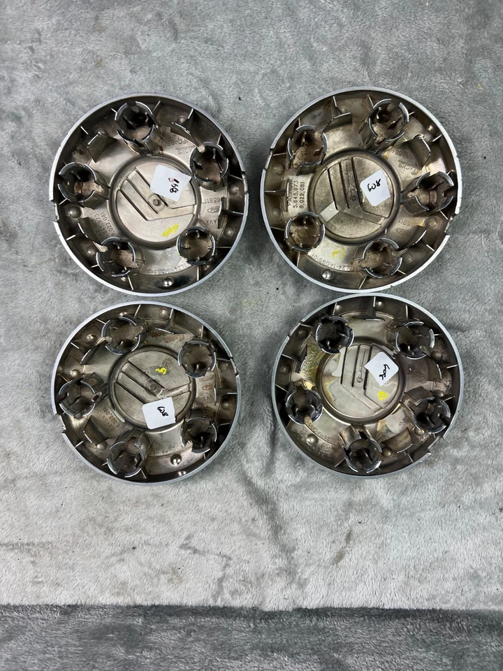 Juego de 4 tapacubos de rueda central Mercury Mountaineer 2002-2005 OEM Foto 2 de 4