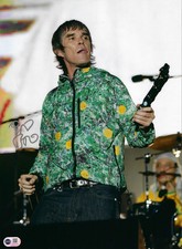 IAN BROWN SIGNED 16x12 STONE ROSES PHOTOGRAPH (ACG CERT AG18779)