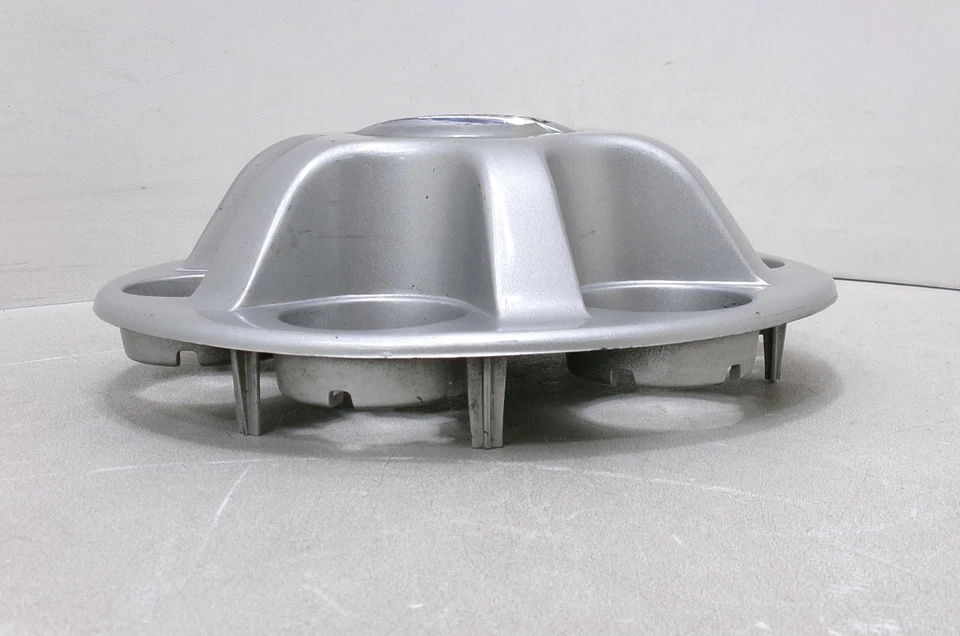 Tapa central de rueda Nissan Xterra 2010 OEM Foto 3 de 4