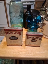 LOT OF 2 VINTAGE OLD PHILIP MORRIS REVELATION SMOKING MIXTURE PIPE TOBACCO  TINS