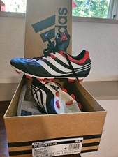 Adidas Scission Traxion FG cleats, red and black, circa 2000
