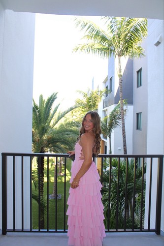 Beginning boutique lace up, pink ruffly prom dress