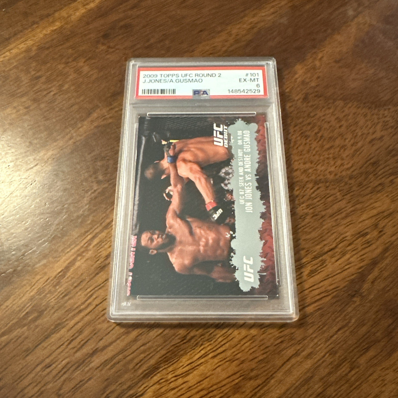 2009 TOPPS UFC ROUND 2 #101 RC ROOKIE JON JONES/ ANDRE GUSMAO PSA 6 POP 15
