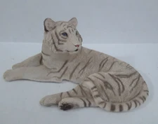 White Lion Sculpture Ceramic Blue Glass Eyes Laying Down 11 in Long x 6 in Wide