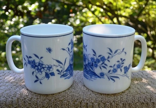 VINTAGE PAIR OF ARCOPAL FRANCE BLUE/WHITE FLORAL MILK GLASS COFFEE MUGS