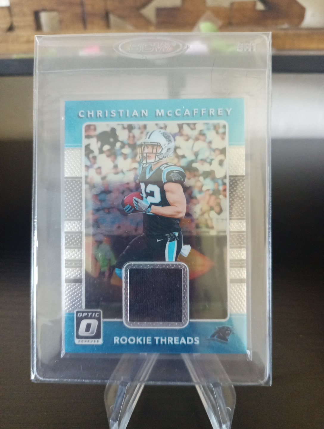 2017 Donruss Optic - Rookie Threads Christian McCaffrey #5 (MEM, RC)