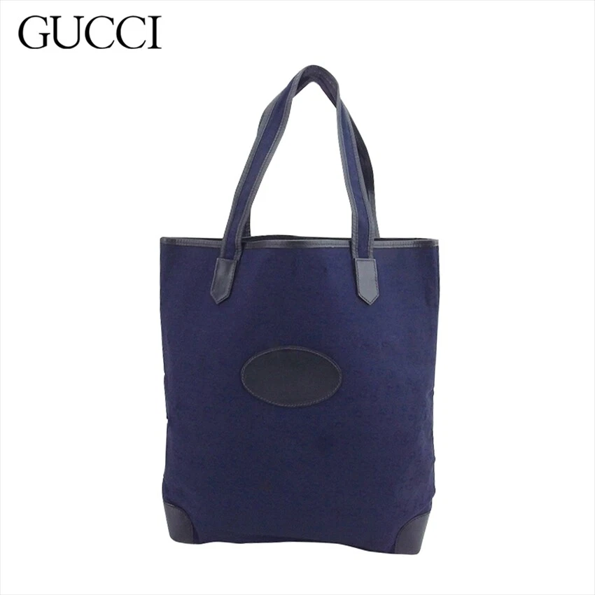 Sac fourre tout GUCCI en toile et cuir motif embout authentique occasion T21559