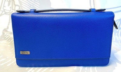 tumi double zip around clutch