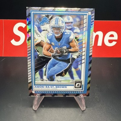 2024 Panini Donruss Optic - Amon-Ra St. Brown Team Logo Prizm /32 Detroit Lions