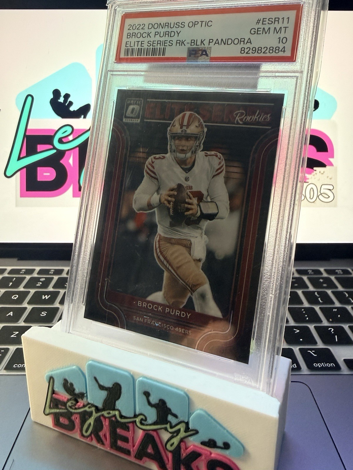 2022 Donruss Optic Brock Purdy Elite Series Black Pandora /25 (RC)  PSA 10