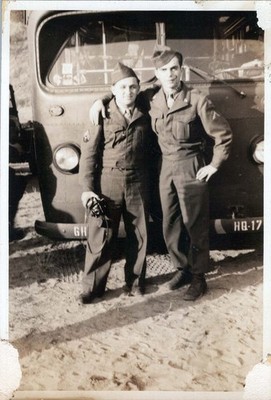 1948 Photo of Two Soldiers Posing by Bus