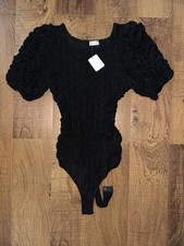 NWT FREE PEOPLE INTIMATES BLACK TEXTURED PUFF SLEEVE BODY SUIT M
