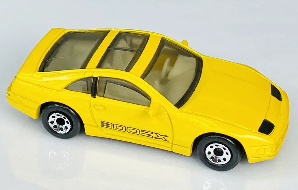マッチ箱 1990 Matchbox - Nissan 300ZX (Yellow w/ Outline Black Tampo