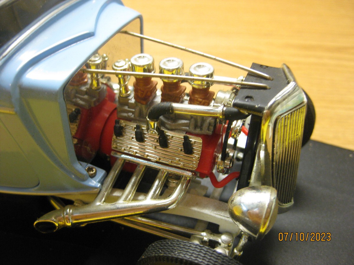 1/18 1934 FORD COUPE HOT ROD IN L.BLUE BY ERTL/AMERICAN 1/18 1934 FORD COUPE HOT ROD IN L.BLUE BY ERTL/AMERICAN