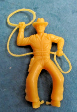 Vintage MPC yellow cowboy with lasso plastic figure toy