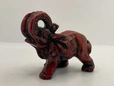 Elephant Figurine Carved Red Resin