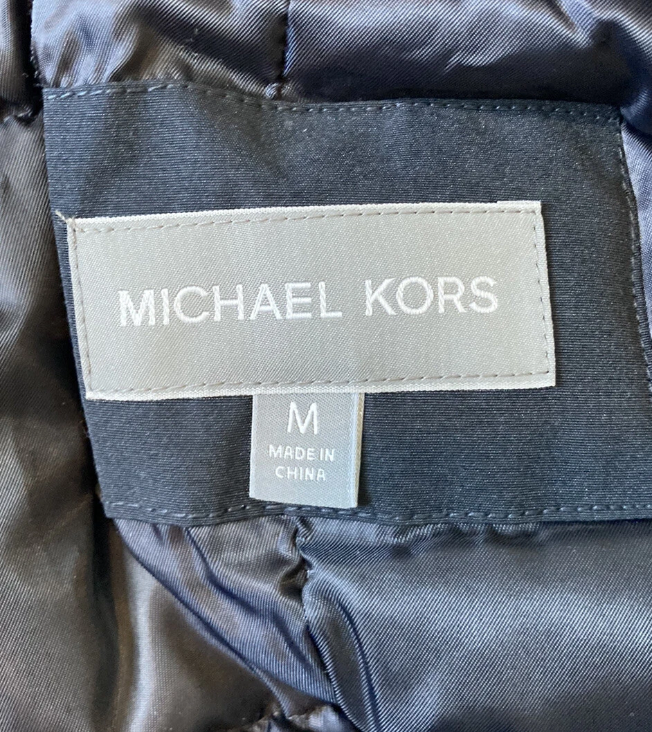 Cappotto tampone Michael Kors nuovo con etichette $375 donna in pelliccia sintetica con cerniera taglia M nero