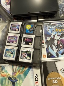 Nintendo New 3DS XL System Black Bundle (Majora&rsquo;s Mask, Pok&eacute;mon Diamond, plus)