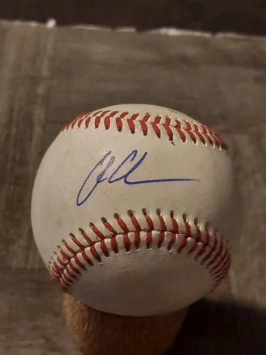 CHARLIE CONDON AUTOGRAPHED BASEBALL ON USED MINOR LEAGUE BALL. ROCKIES