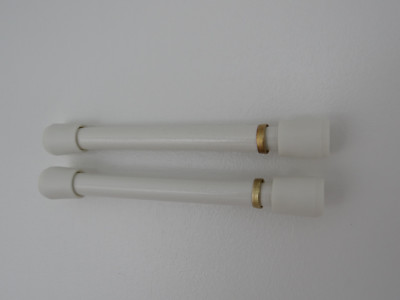  Spring Curtain Tension Rods White and Brass extend 5'' to 6 1/2''.