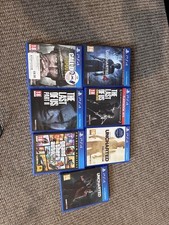 Sony PlayStation 4 Console Bundle with DualShock 4 Controller, Cables & 7 Games