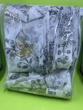 Marrakesh 4-Pack Rod Pocket Solid with Printed Voile Window Curtain Pane