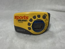 VINTAGE SONY SPORTS WALKMAN AM/FM RADIO WITH ARM BAND / CLIP SRF-M78
