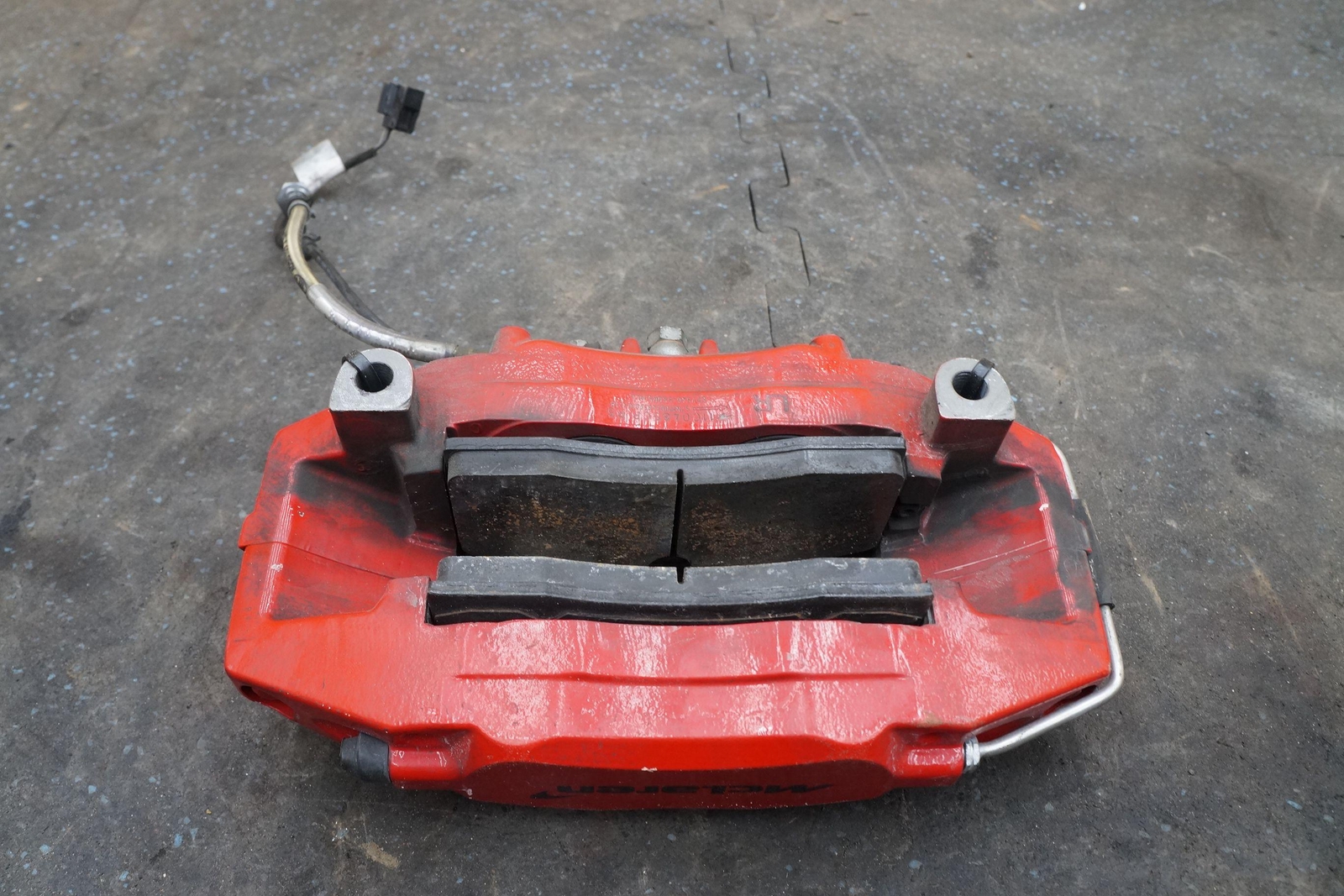 Rear Left Brake Caliper & Bracket Red 11C0485CP OEM McLaren 570S 650S 2017