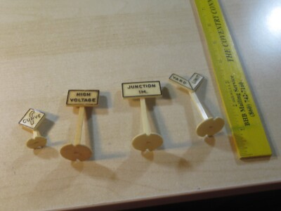 LOT OF 4 PLASTIC HIGH VOLTAGE CURVE YARD LIMIT SIGNS TOYS 1950'S O SCALE LIONEL