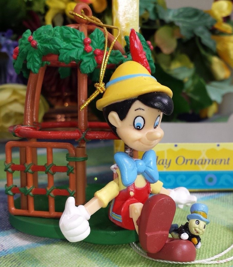 Pinocchio & Jiminy Cricket on a bird cage Disney Enesco Ornament