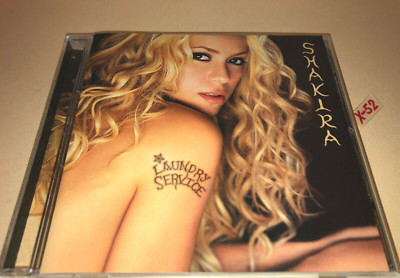 Shakira CD Laundry Service hits Whenever Wherever Suerte Underneath Your Clothes