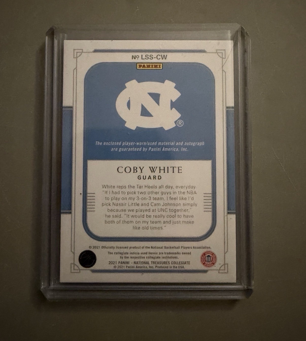 2021 Coby White National Treasures Collegiate Jersey Patch Auto Numbered 01/10 view 2