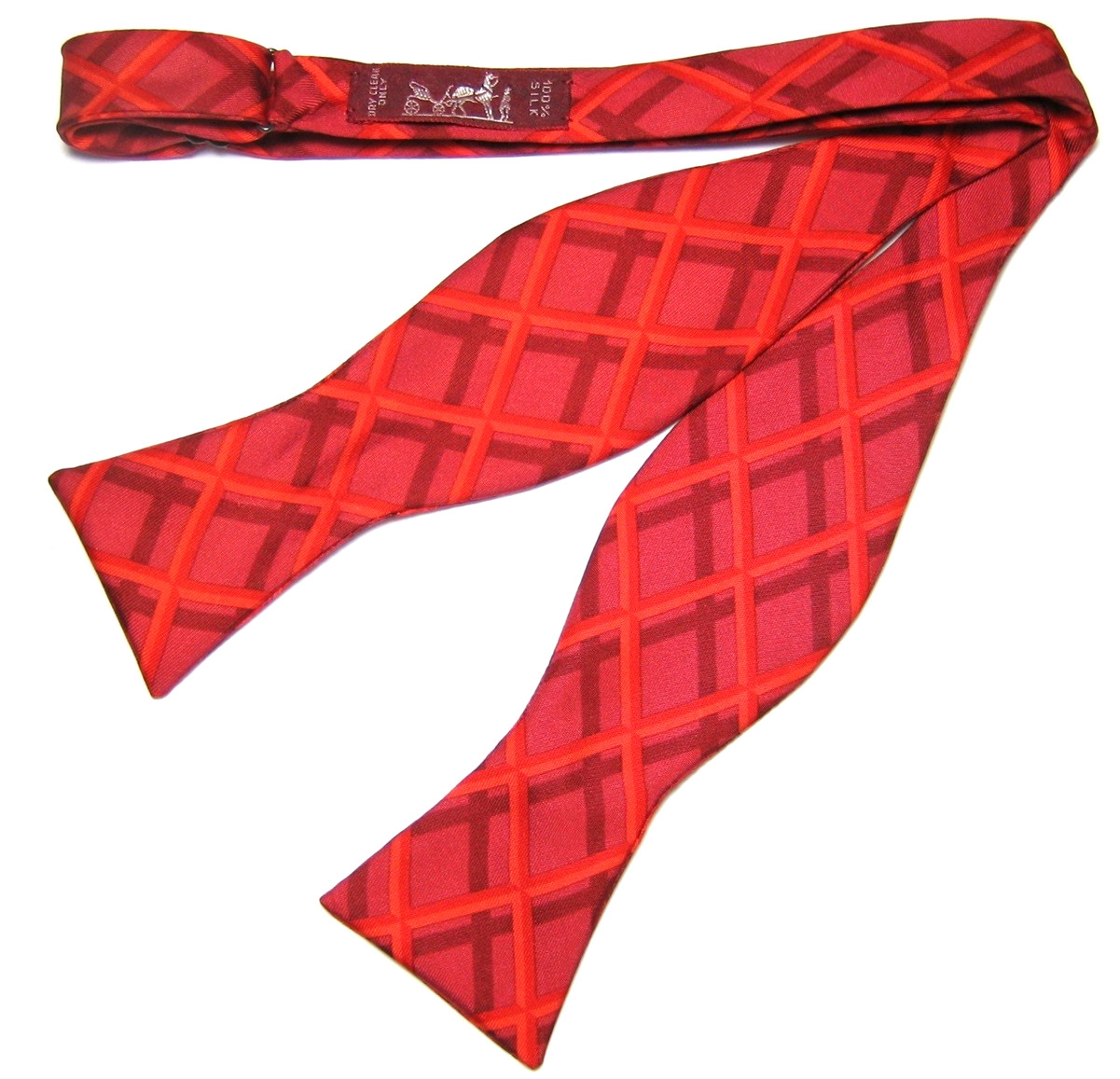 NWOT HERMÈS BOWTIE! VERY RARE! RED AND ORANGE GEOMETRIC DESIGN ON SILK  5309 TA thumbnail 5
