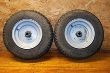 John Deere Sabre 2048 Front Wheels AM130202 Titan Super Turf Tires