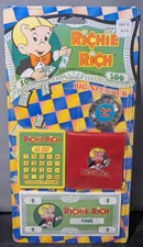 Ja-Ru 1988 RICHIE RICH BIG SPENDER Rack #2716 Play Set - NEW