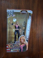 WWE  ELITE COLLECTION FLASHBACK FIRST TIME IN LINE SERIES 24 TRISH STRATUS