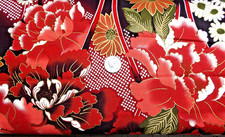P B FABRICS WITH A BEAUTIFUL FLORAL ON A BLACK BACKGROUND BTY